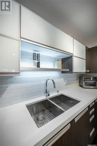 218 1545 Neville Drive, Regina, SK - Indoor Photo Showing Kitchen With Double Sink