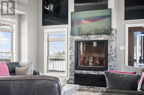 8 Ivys Way, Logy Bay, NL - Indoor Photo Showing Living Room With Fireplace