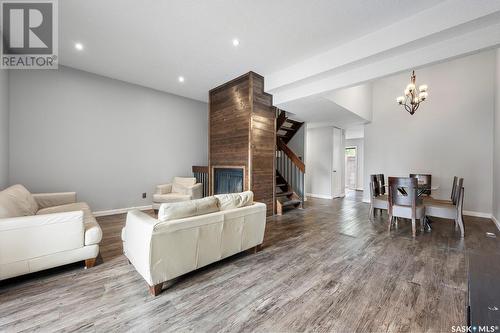 15 Asgar Walk, Regina, SK - Indoor Photo Showing Living Room With Fireplace