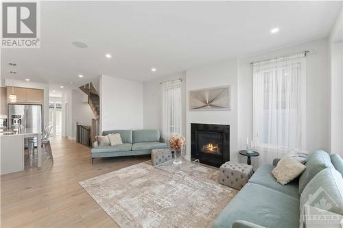 294 Squadron Crescent, Ottawa, ON - Indoor Photo Showing Living Room With Fireplace
