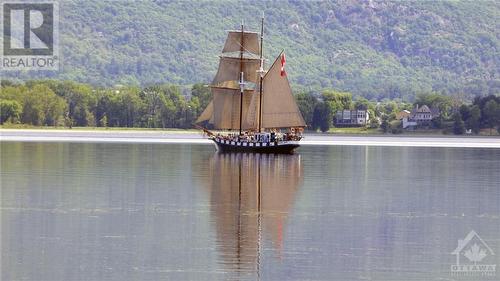 Blackjack tall ship is a regular visitor along the Ottawa River. - 620 Bayview Drive, Ottawa, ON - Outdoor With Body Of Water With View