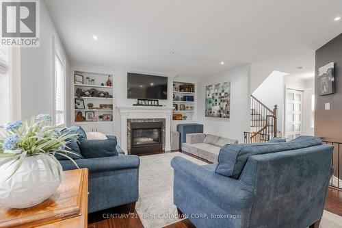 104 High Street, Lucan Biddulph, ON - Indoor Photo Showing Living Room With Fireplace