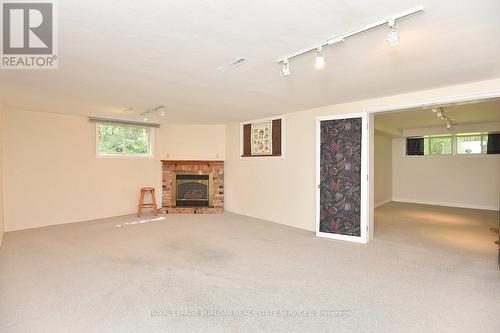 3023 St Clair Avenue, Burlington, ON - Indoor With Fireplace
