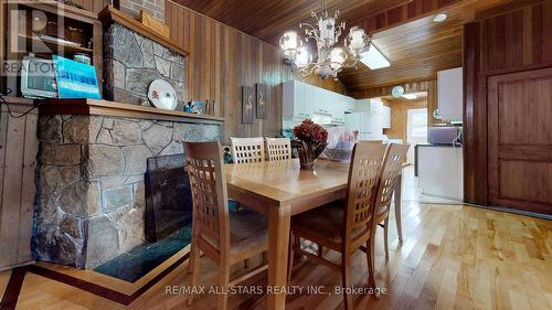 8 Tikvah Circle, Georgina, ON - Indoor Photo Showing Dining Room With Fireplace