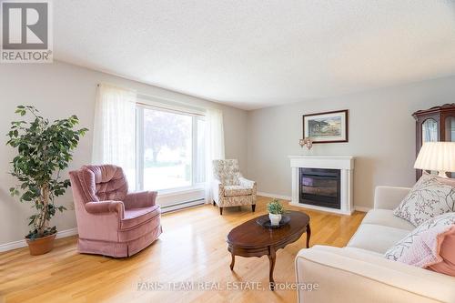 1124 Marcellus Drive, Midland, ON - Indoor Photo Showing Living Room With Fireplace