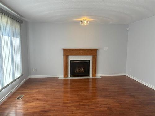 22 Chelmsford Place, Hamilton, ON - Indoor Photo Showing Living Room With Fireplace