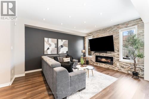 61 Jackson Drive, New Tecumseth, ON - Indoor Photo Showing Living Room With Fireplace