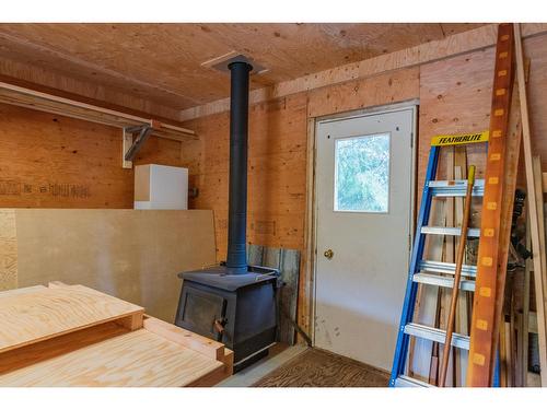 643 Galena Avenue, Kaslo, BC - Indoor Photo Showing Other Room With Fireplace