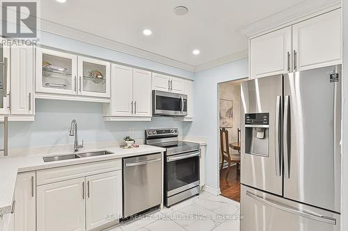 174 - 20 Moonstone Byway, Toronto, ON - Indoor Photo Showing Kitchen With Double Sink