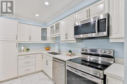 174 - 20 Moonstone Byway, Toronto, ON - Indoor Photo Showing Kitchen With Double Sink