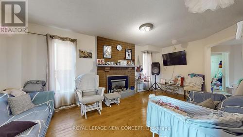 55 Morton Crescent, Barrie (Sunnidale), ON - Indoor Photo Showing Living Room With Fireplace