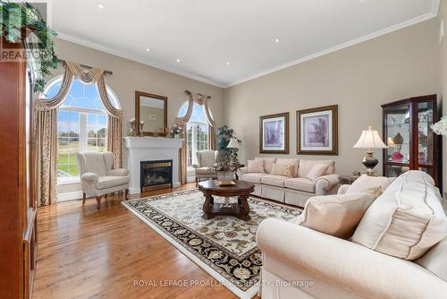 1366 Ontario Street, Hamilton Township, ON - Indoor Photo Showing Living Room With Fireplace