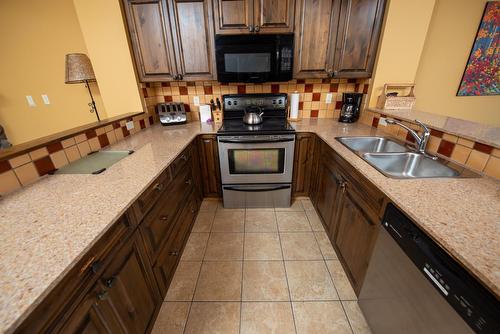 M2-A - 1351 Gerry Sorensen Way, Kimberley, BC - Indoor Photo Showing Kitchen With Double Sink