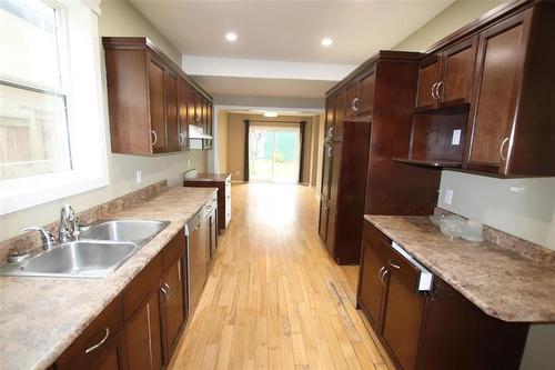 516 Fischer Avenue, The Pas, MB - Indoor Photo Showing Kitchen With Double Sink