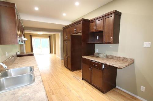 516 Fischer Avenue, The Pas, MB - Indoor Photo Showing Kitchen With Double Sink