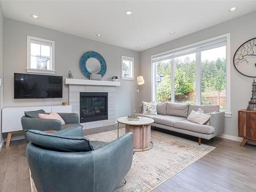 406 Bonaparte St, Colwood, BC - Indoor Photo Showing Living Room With Fireplace