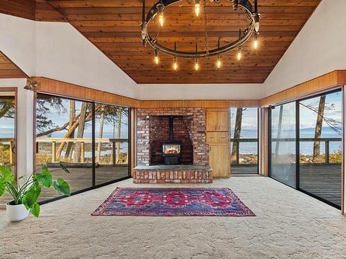 6055 Maclean Rd, Hornby Island, BC - Indoor With Fireplace
