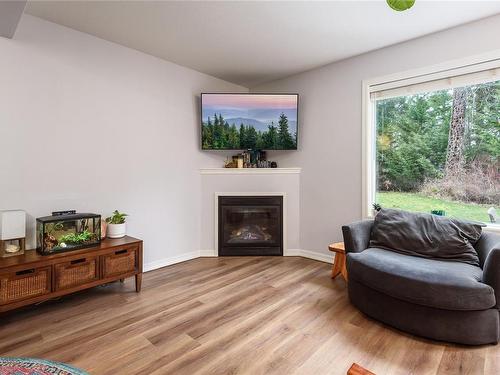 2-2882 Piercy Ave, Courtenay, BC - Indoor Photo Showing Living Room With Fireplace