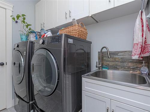 4510 Thompson Clarke Dr East, Bowser, BC - Indoor Photo Showing Laundry Room