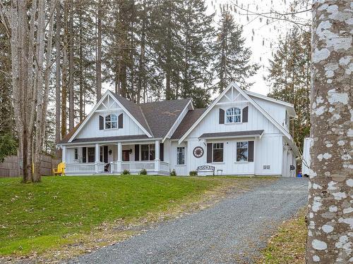 4510 Thompson Clarke Dr East, Bowser, BC - Outdoor With Facade