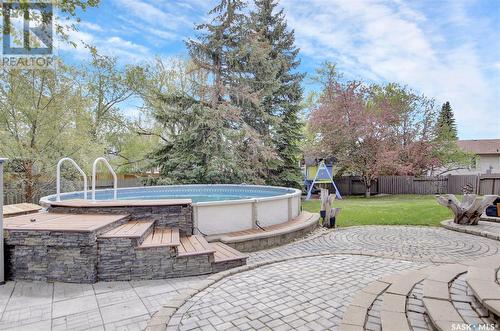2731 Livingstone Bay E, Regina, SK - Outdoor With Above Ground Pool With Backyard