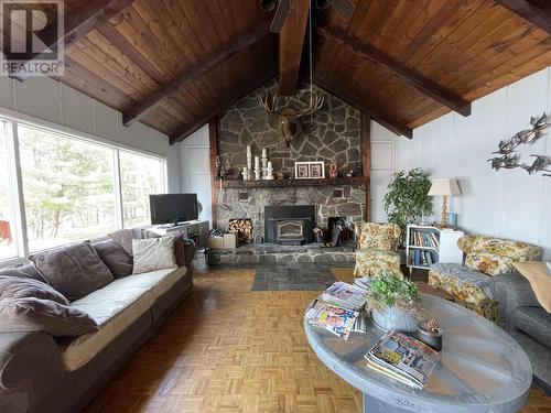 0 Top Lake, Island Lake, ON - Indoor Photo Showing Living Room With Fireplace