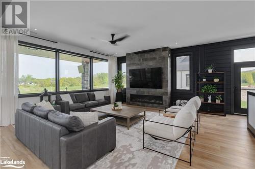 4 Raintree Court, Clearview, ON - Indoor Photo Showing Living Room With Fireplace