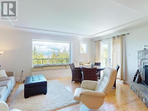 2389 Wall Street, Texada Island, BC - Indoor Photo Showing Living Room With Fireplace