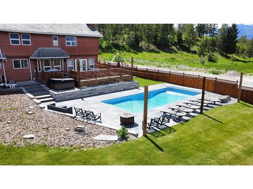 945 Westridge Way, Invermere, BC - Outdoor With In Ground Pool With Deck Patio Veranda With Backyard