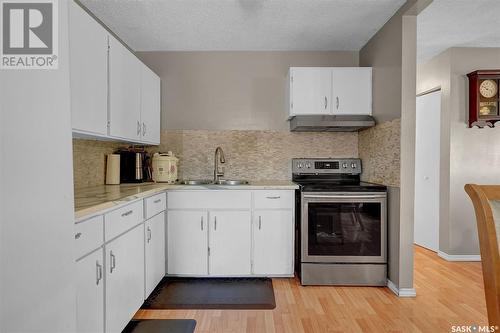 842 Ominica Street W, Moose Jaw, SK - Indoor Photo Showing Kitchen With Double Sink
