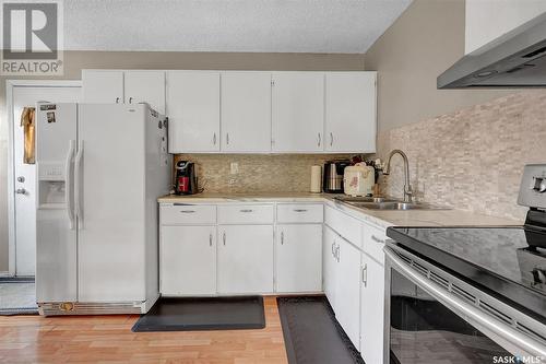842 Ominica Street W, Moose Jaw, SK - Indoor Photo Showing Kitchen With Double Sink