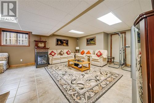 11117 Timber Bay, Windsor, ON - Indoor Photo Showing Basement With Fireplace