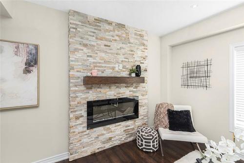 10 Crossings Way, Stoney Creek, ON - Indoor Photo Showing Living Room With Fireplace