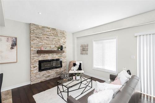 10 Crossings Way, Stoney Creek, ON - Indoor Photo Showing Living Room With Fireplace