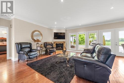 1597 Ste Marie Street, Embrun, ON - Indoor Photo Showing Living Room With Fireplace