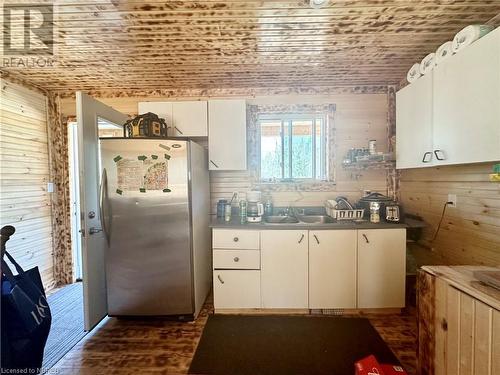 1348 Peddlers Dr Drive, Mattawa, ON - Indoor Photo Showing Kitchen With Double Sink