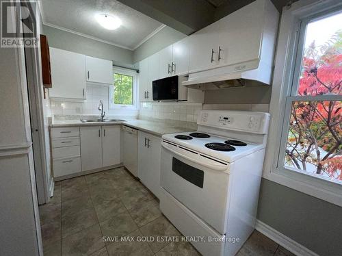 Upper - 4 Elmwood Avenue, St. Catharines, ON - Indoor Photo Showing Kitchen With Double Sink
