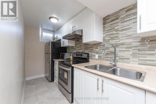 5033 Dubonet Drive, Mississauga, ON - Indoor Photo Showing Kitchen With Double Sink