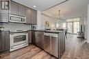 712 - 551 Maple Avenue, Burlington, ON  - Indoor Photo Showing Kitchen With Upgraded Kitchen 