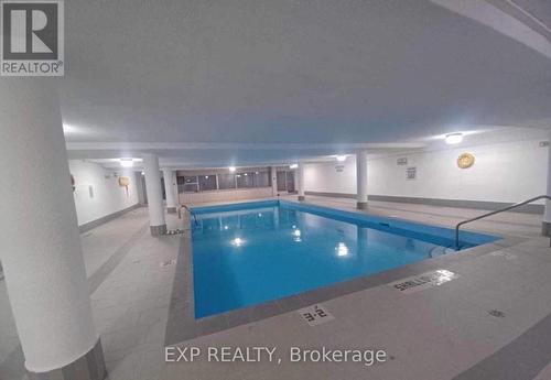 233 - 2095 Roche Court, Mississauga, ON - Indoor Photo Showing Other Room With In Ground Pool