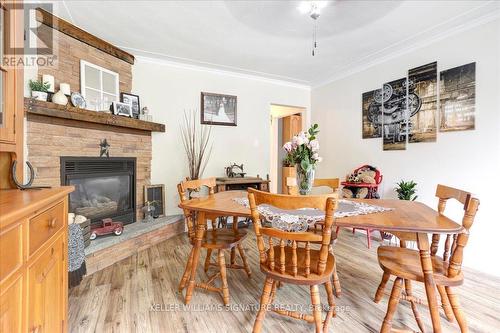 1320 Bunnell Drive, Burlington, ON - Indoor Photo Showing Dining Room With Fireplace