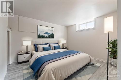 This photo has been virtually staged. - 129 Concord Street S, Ottawa, ON - Indoor Photo Showing Bedroom