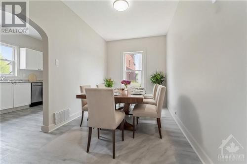 This photo has been virtually staged. - 129 Concord Street S, Ottawa, ON - Indoor Photo Showing Dining Room