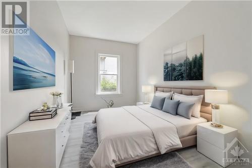 This photo has been virtually staged. - 129 Concord Street S, Ottawa, ON - Indoor Photo Showing Bedroom