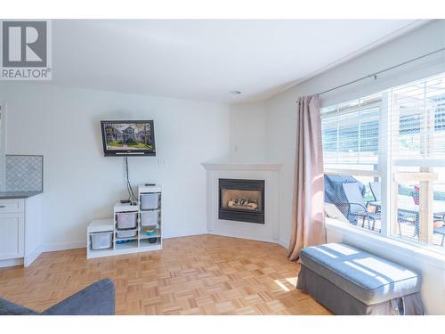 5303 Timble Lane, Kelowna, BC - Indoor Photo Showing Living Room With Fireplace