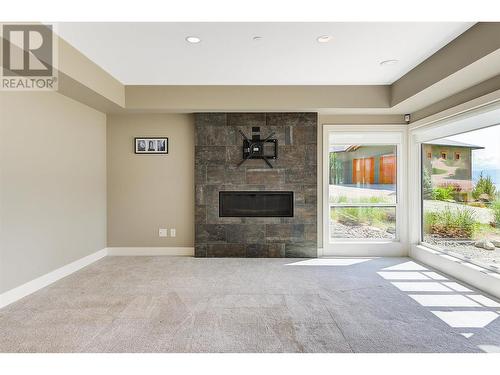 1690 Travertine Drive, Lake Country, BC - Indoor Photo Showing Living Room With Fireplace