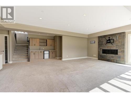 1690 Travertine Drive, Lake Country, BC - Indoor With Fireplace