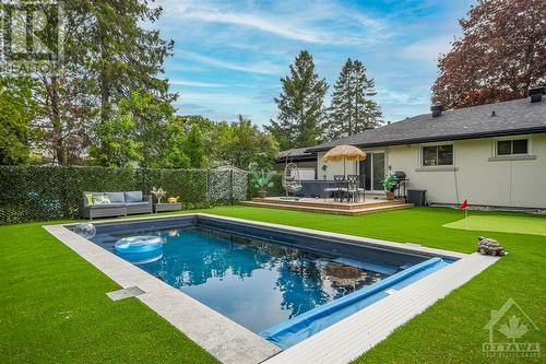Unit 1 - Fiber Glass Pool with high end auto cover - 3 Newark Avenue, Ottawa, ON - Outdoor With In Ground Pool With Deck Patio Veranda With Backyard