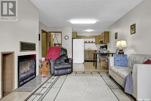 6513 Rochdale Boulevard, Regina, SK - Indoor Photo Showing Living Room With Fireplace