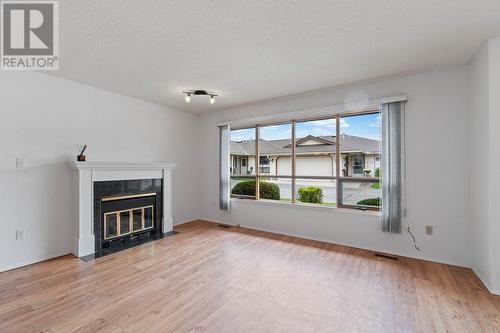 151 8Th Avenue Sw Unit# 18, Salmon Arm, BC - Indoor Photo Showing Living Room With Fireplace